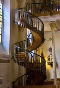 There is a staircase in in the Loretto Chapel in Santa Fe, NM, which is famous for its “Miraculous staircase, a spiral staircase with a fascinating history and unique construction. 
