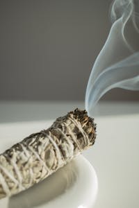 1. Cleanse the Space
Light your candle. If you have sage or incense, waft it around your body and the space, saying:
“I clear this space of old pain, illusion, and energetic residue. I welcome clarity, healing, and truth.”
